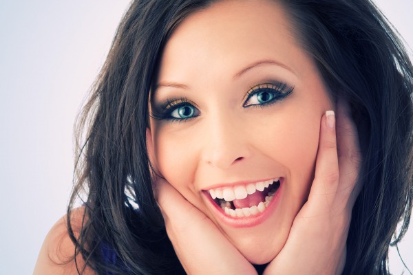 Headshot of excited young woman