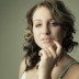 Thoughtful woman looking at camera