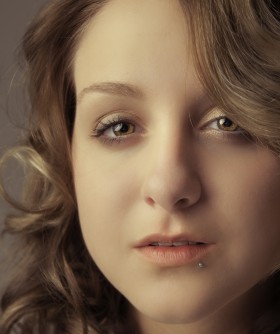 Attractive woman looks at camera